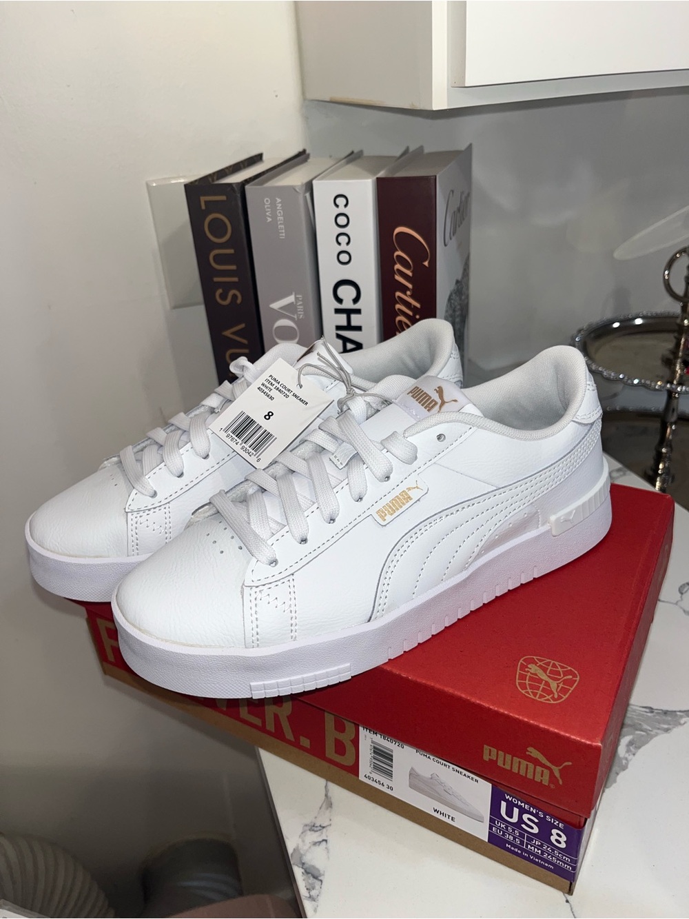 Puma White Low-Top Leather-Style Sneakers with Gold Accents